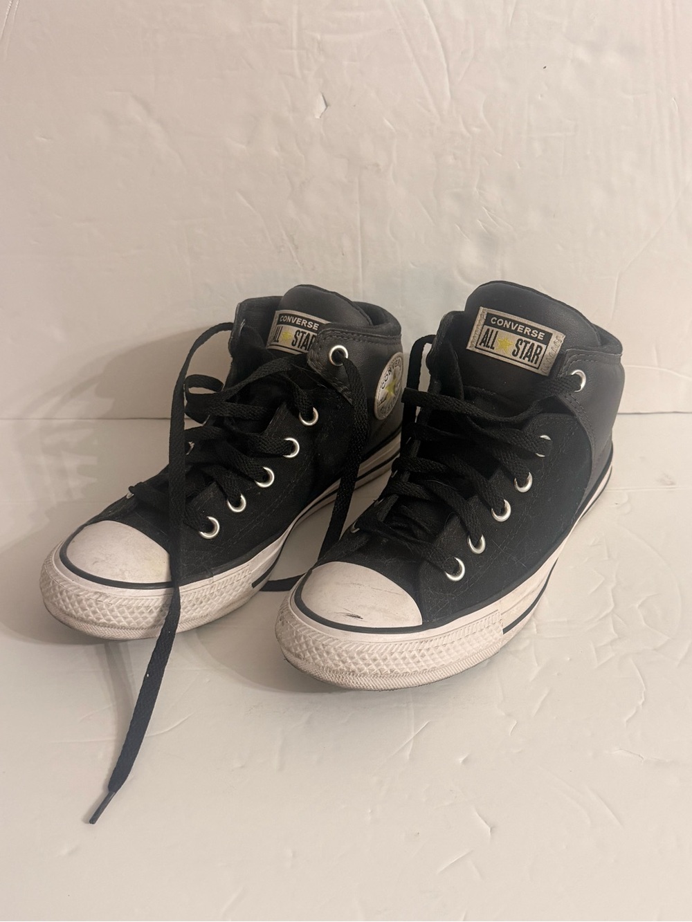 Chuck Taylor Converse Black and White High-Top Sneakers